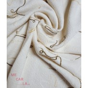Tejido de lana rizada en blanco roto bordada con hilo de mecha en tonos tostados